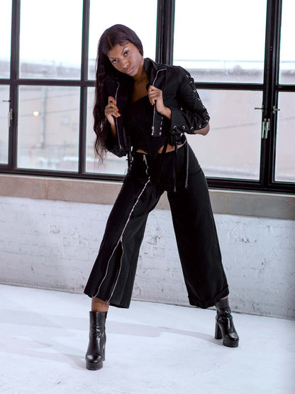 ASYMMETRICAL WOVEN SLEEVE GROMMET RUFFLE JACKET