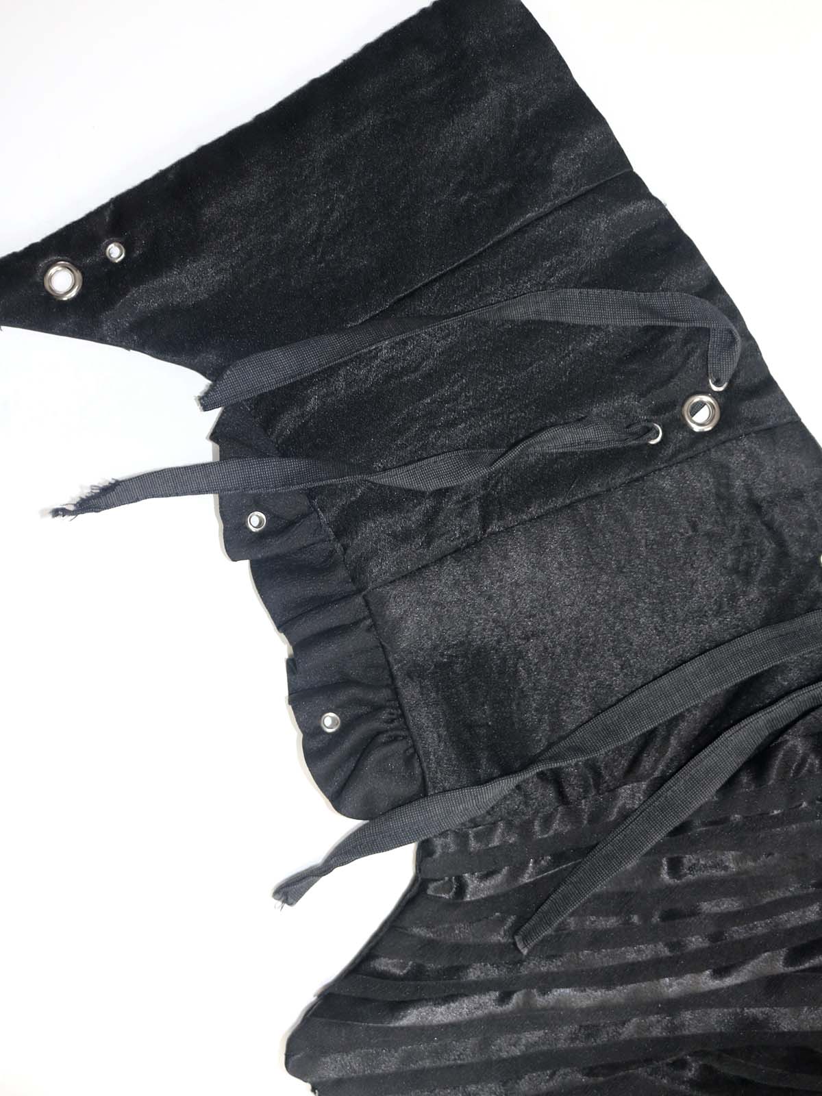 ASYMETRICAL RUFFLE TRIM GROMMET CORSET